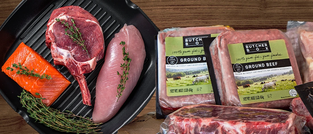 Meat products of a specific brand called Butcherbox and raw meats on top of griller pan