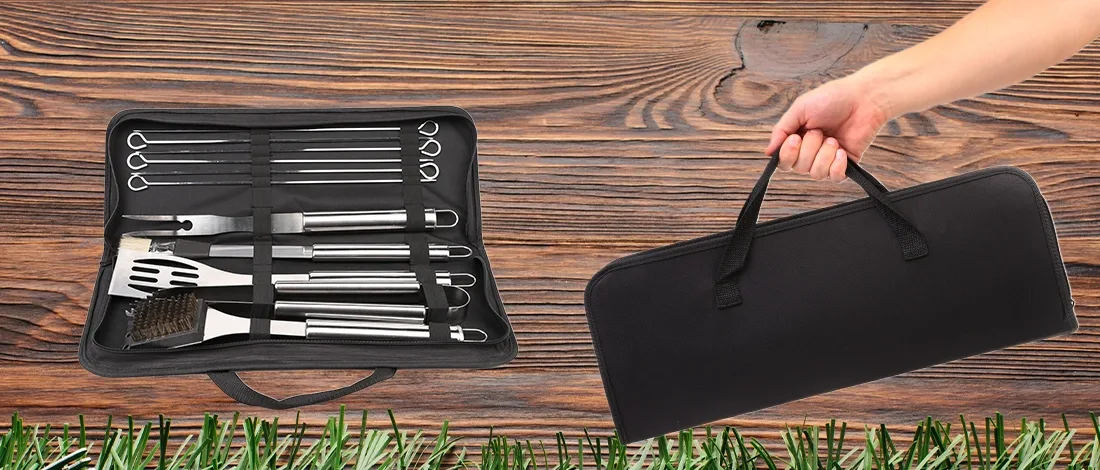 Holding a bag of BBQ grill tools