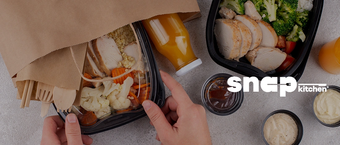 Taking out the food delivery from the paperbag