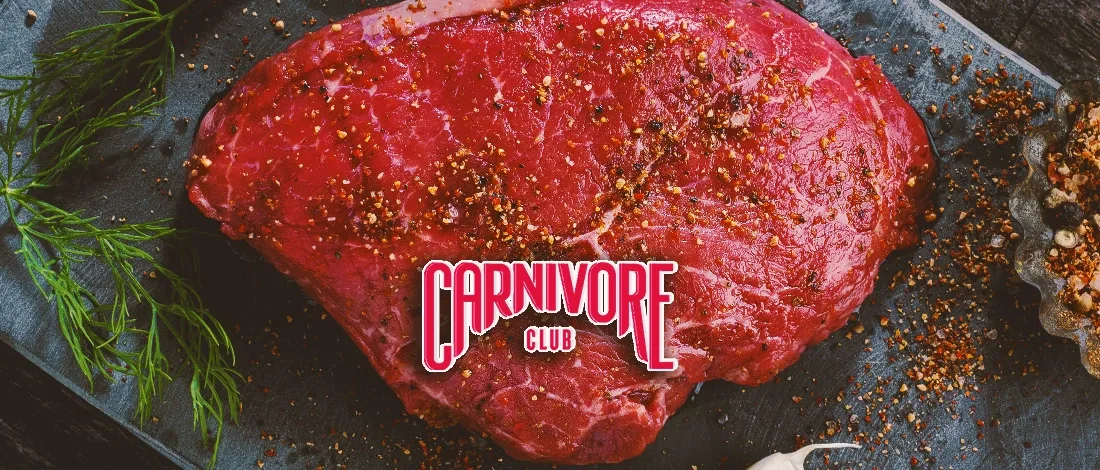 A big piece of steak with the carnivore club logo