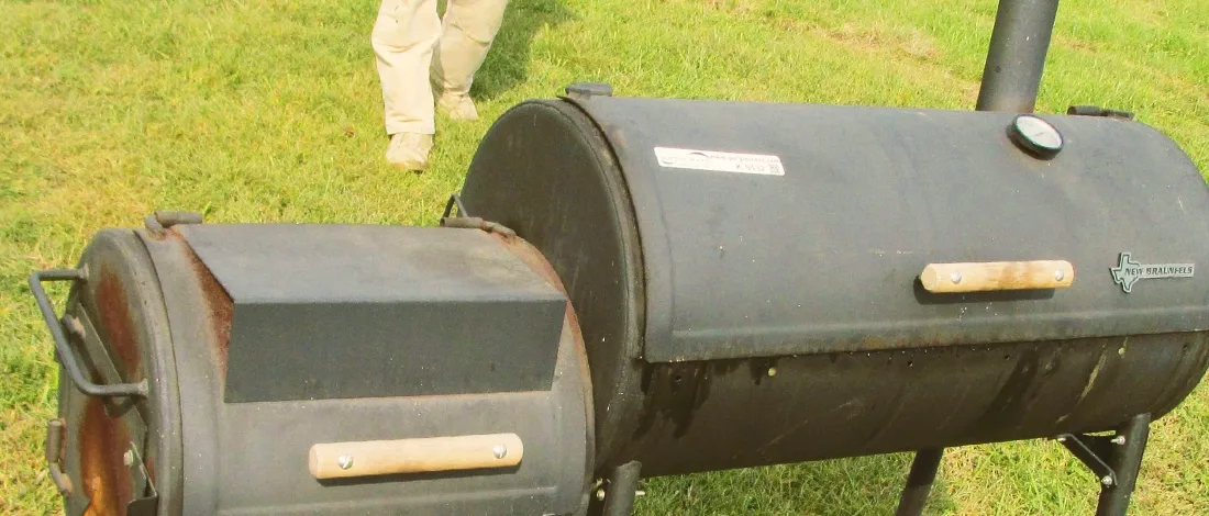 Am old rusty food smoker outside