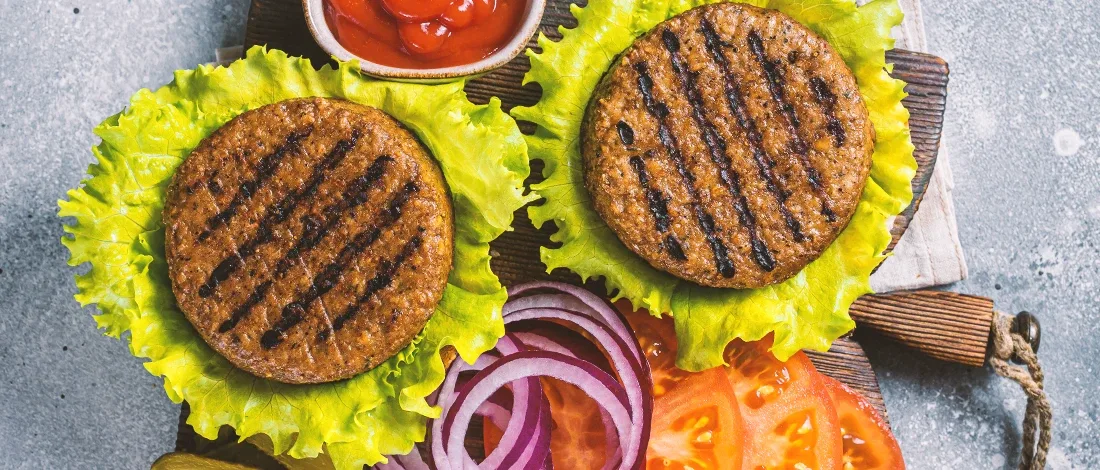 A top view image of plant-based burger patties