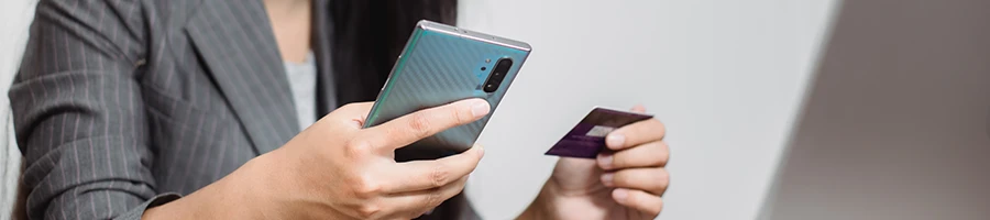 An image of a woman browsing online for the best flat top grills