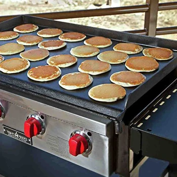 A close up image of flat top grill made with good construction material