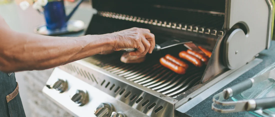 Sausages on a grill