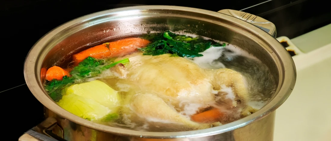 A delicious turkey broth in a pot