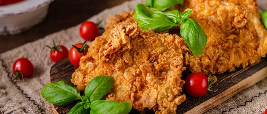 Two pieces of crispy fried deer steak